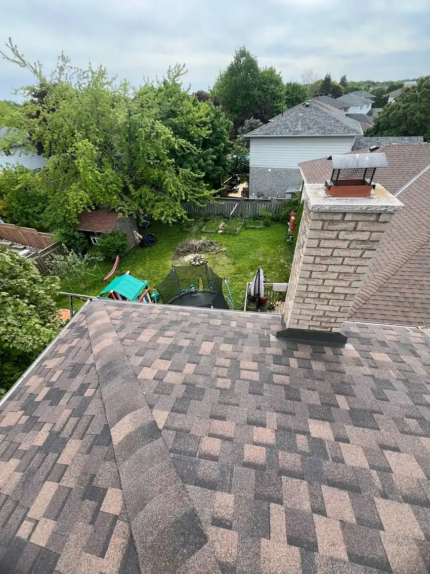 Close-up of new shingles and flashing detail