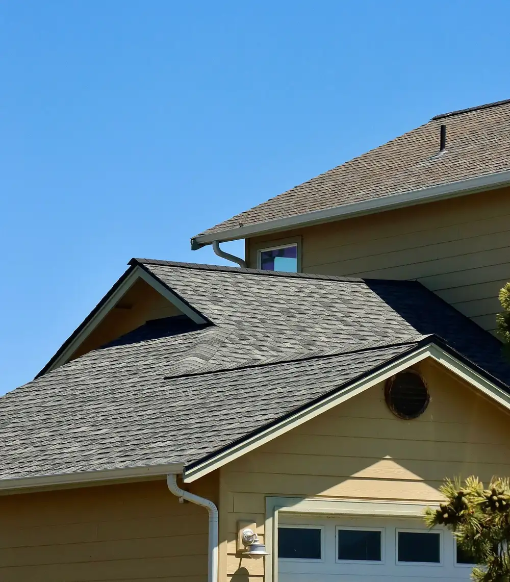 Completed roofing project on a large home