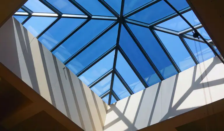 Roof ventilation installed along a shingle roofline